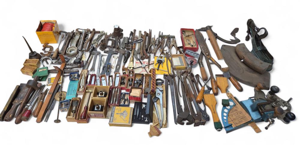 Context image for reviewing antique wood and iron tool surfaces similar to wagon wheel materials.