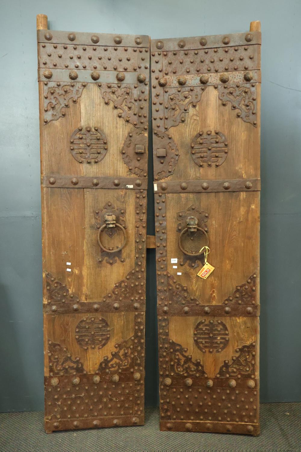Auction comp thumbnail for PAIR OF ANTIQUE CHINESE ELM COMPOUND DOORS WITH CAST IRON KNOBBED CLADDING AND FOO DOG RING PULL HANDLES, CONSTRUCTED WITH HAND FORGED NAILS, VERY HEAVY, APPROX. 223CM X 53CM EACH (Albion Antique Auction Centre, Lot 1381)