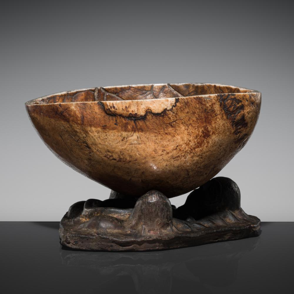 Auction comp thumbnail for A NEWARI HUMAN BONE KAPALA WITH A POTTERY STAND, TIBET, 18th-19TH CENTURY (Galerie Zacke, Lot 57)