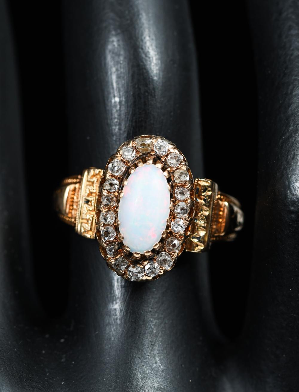 Auction comp thumbnail for 14K ANTIQUE OPAL & DIAMOND RING (Burchard Galleries Inc, Lot 1119)