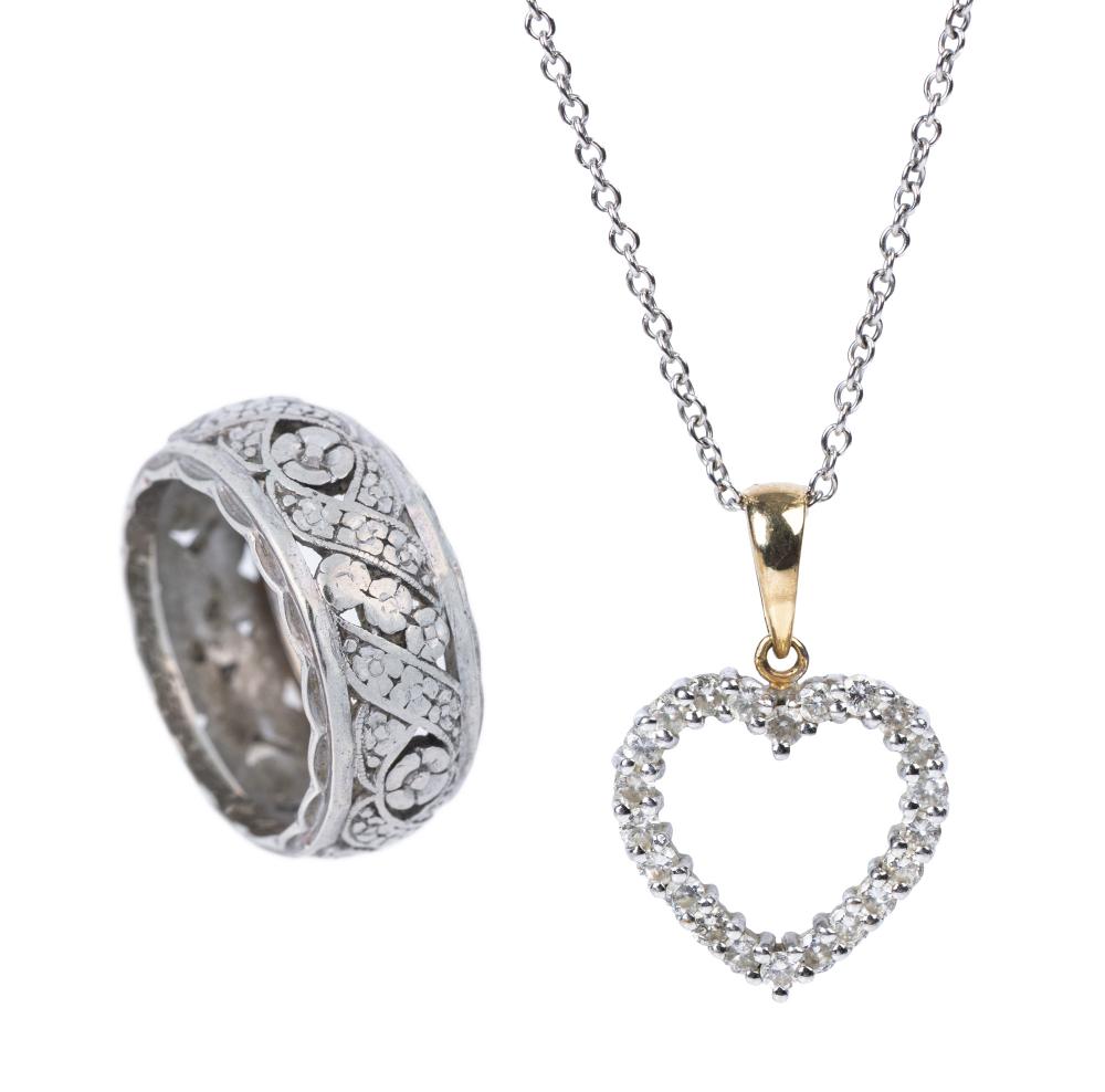 Auction comp thumbnail for Vintage/Antique 14K Yellow and White Gold Diamond Heart Pendant and Chain Plus 1920s Petite Antique Ring (Goldberg Coins & Collectibles, Lot 1110)