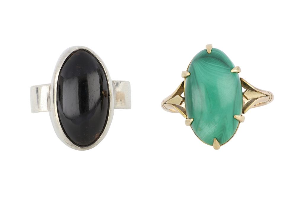 Auction comp thumbnail for Sterling Silver Onyx Dress Ring and Antique 9ct gold ring claw set with a polished Malachite, Onyx ring finger size L, Malachite ring finger size P, Malachite ring weight 5.50 Grams (Pfeffer's Auctions, Lot 143)