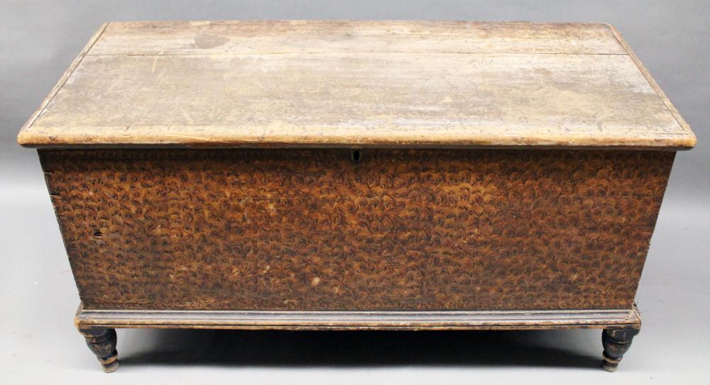 Auction comp thumbnail for Furniture: antique paint decorated blanket chest; softwood dovetailed chest in original brown turned -brush sponge type decoration; turned painted black feet & trim; original inset lock, no key; til box interior; two-board lid; 26” T X 22” D X 49 ½” (Roan Inc. Auctioneers & Appraisers, Lot 440)