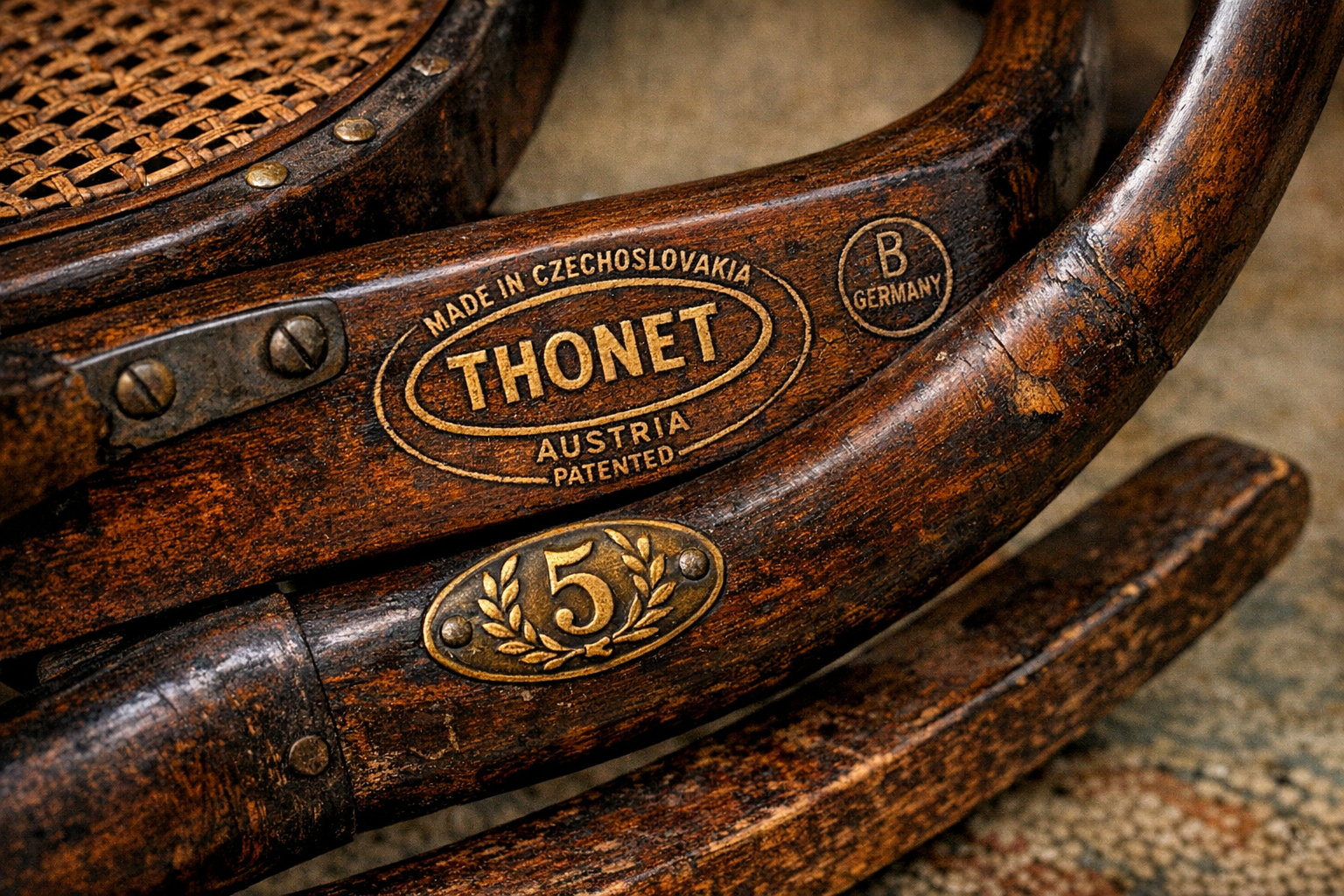 Close-up of Thonet maker’s mark and other identifying features on collectible rockers