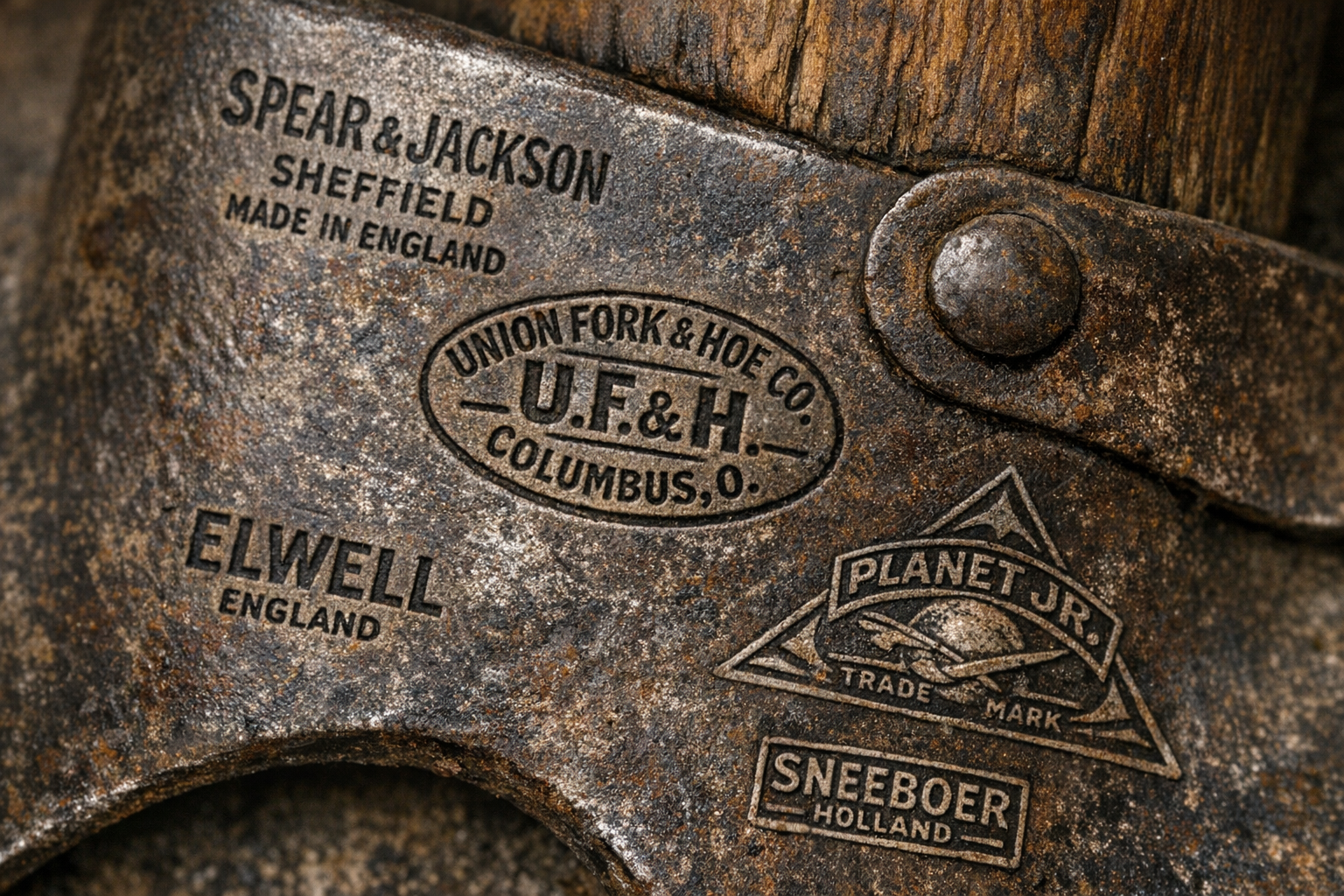 Close-up of manufacturer’s mark on an antique garden tool