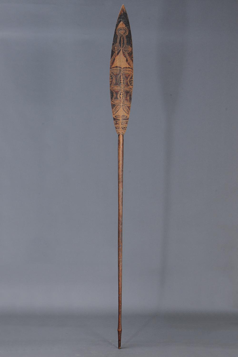 Auction catalog photo of a ceremonial paddle lot 190