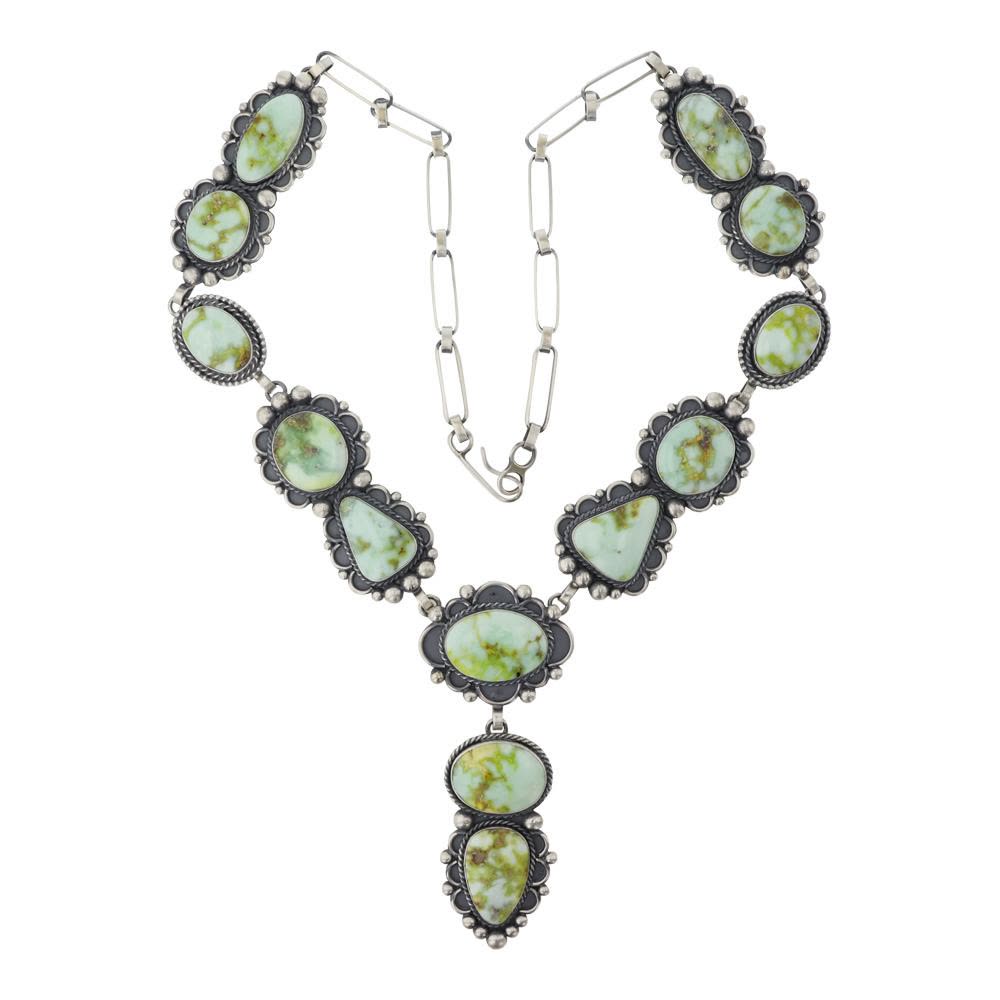 Auction photo of a variscite lariat necklace described as Sioux maker Mary Ellen Peace, Billy The Kid Auction House lot 397
