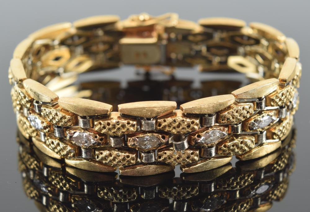 Auction comp thumbnail for Lady's 18K gold diamond bracelet set with 6 marquis brilliant cut diamonds. Each approx 0.20CT, H-I color, and SI1-SI2 clarity. 49.65 grams. Bracelet length: 7in. Includes a 2021 insurance appraisal from Anderson's... (Tremont Auctions, Lot 35)
