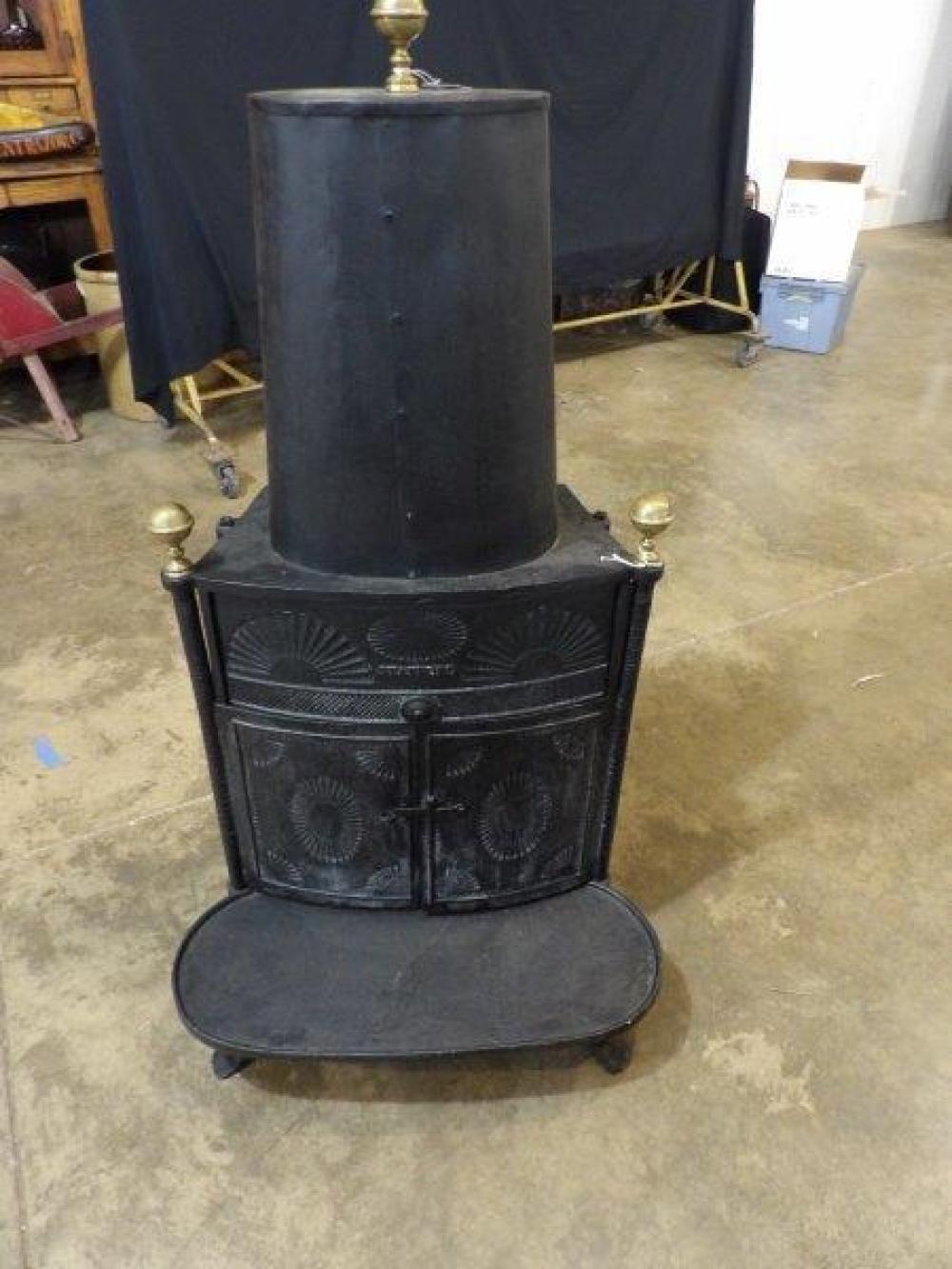 Auction comp thumbnail for Stafford cast iron stove with brass finials (Atlee Raber Auctioneer, Lot 594)