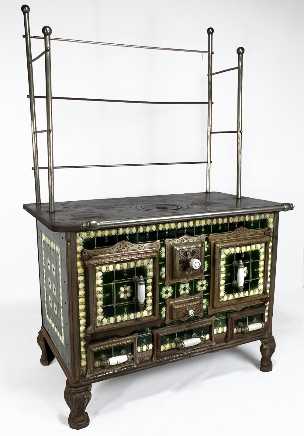 Auction comp thumbnail for FRENCH ART NOUVEAU TILE AND CAST IRON COOKING STOVE (CRN Auctions, Lot 276)
