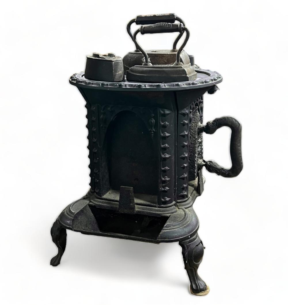 Auction comp thumbnail for Small Antique Cast Iron Stove. (Direct Auction Galleries, Inc., Lot 674)