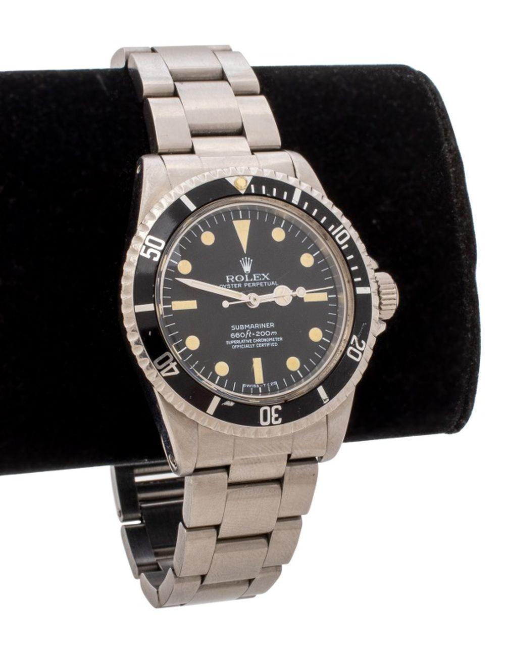 Reference image for documenting Rolex serial number lookup and watch appraisal factors including serial location, model reference, bracelet and clasp codes, dial, bezel, movement, service history, condition, and provenance