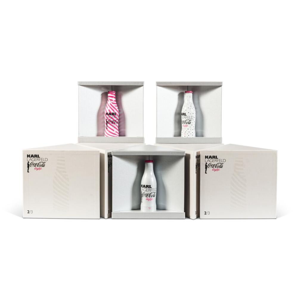 Auction comp thumbnail for A set of thirty-three triangular sets of three Coca-Cola light bottles, designed by Karl Lagerfeld in 2011 (Sotheby's, Lot 231)