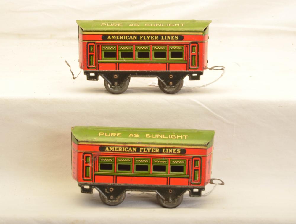 Auction comp thumbnail for Am Flyer Prewar O Ga. Scarce Orange/Green Lithographed Pass Cars with Drink Coca Cola in Bottles on Roofs (Stout Auctions Toy and Train Specialists, Lot 2249)