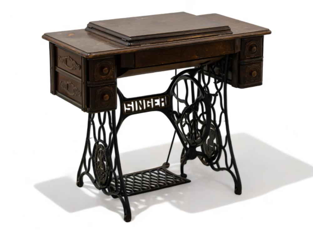 Auction comp thumbnail for A 1926 Singer Sewing Machine With Table, 77cm X 88cm X 42cm (5th Avenue Auctioneers, Lot 56)