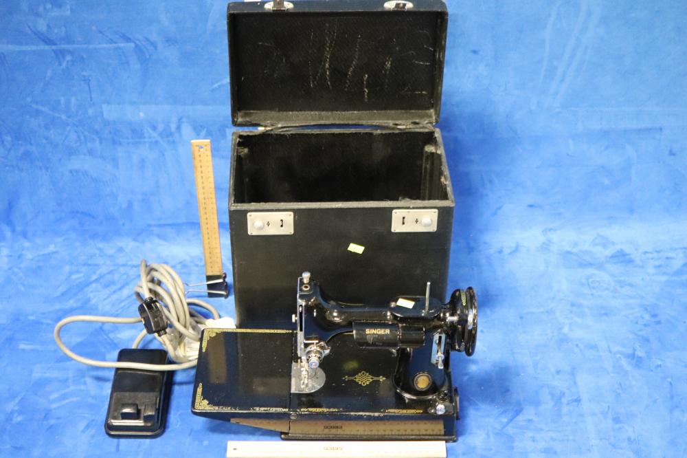 Auction comp thumbnail for SINGER SEWING MACHINE, PORTABLE IN BLACK BOX (Albion Antique Auction Centre, Lot 1124)