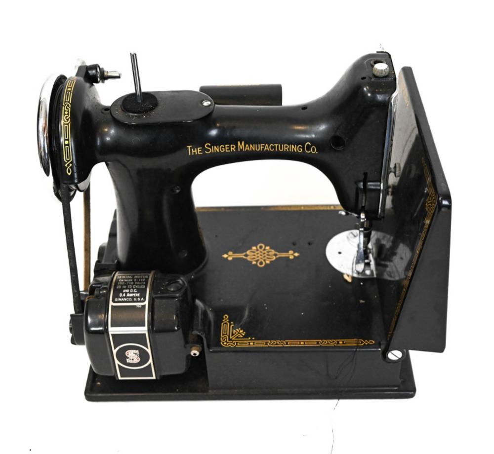 Auction comp thumbnail for Antique Portable Singer Sewing Machine Model 221-1 (Greenwich Auction, Lot 183)