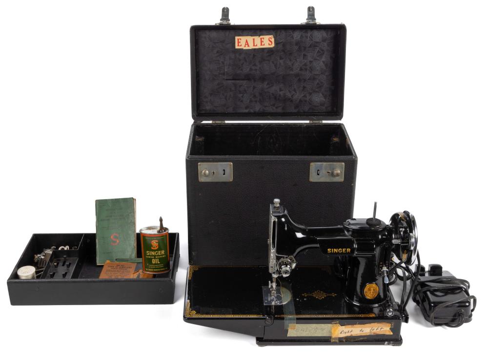 Auction comp thumbnail for SINGER MODEL NO. 221 / FEATHERWEIGHT PORTABLE TABLE-TOP ELECTRIC SEWING MACHINE (Jeffrey S. Evans & Associates, Lot 2051)