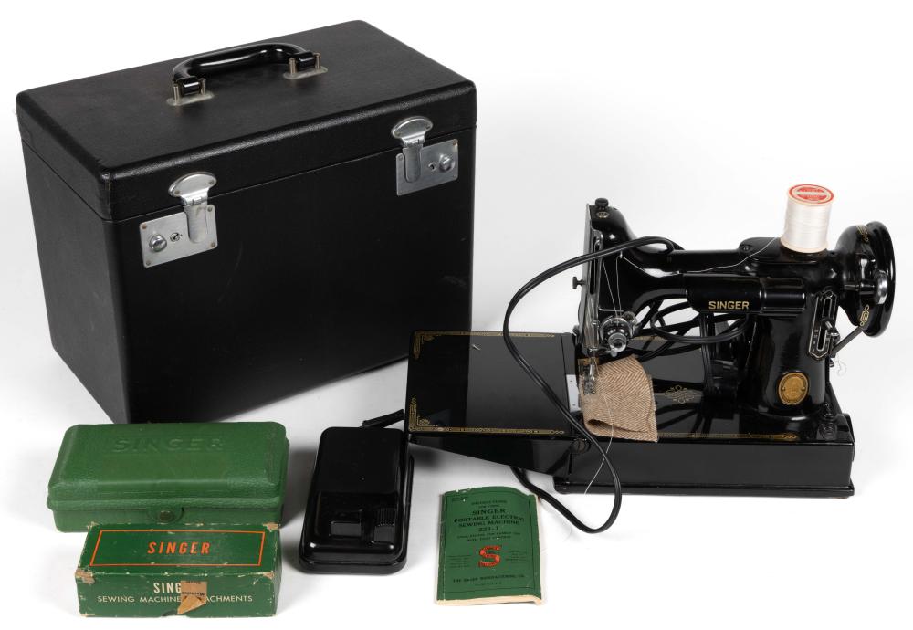 Auction comp thumbnail for SINGER MODEL NO. 221-1 / FEATHERWEIGHT PORTABLE TABLE-TOP ELECTRIC SEWING MACHINE (Jeffrey S. Evans & Associates, Lot 2055)
