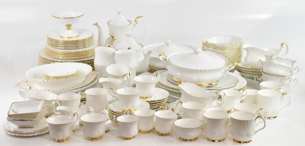 Auction comp thumbnail for ROYAL ALBERT; an extensive tea and dinner service in the 'Val D'or' pattern, comprising three tureens, coffee pot, teapot, two sauce boats, salt and pepper shakers, two cream jugs, six coffee cans and saucers, twelve bowls, six soup bowls and saucers (Adam Partridge Auctioneers, Lot 1503)