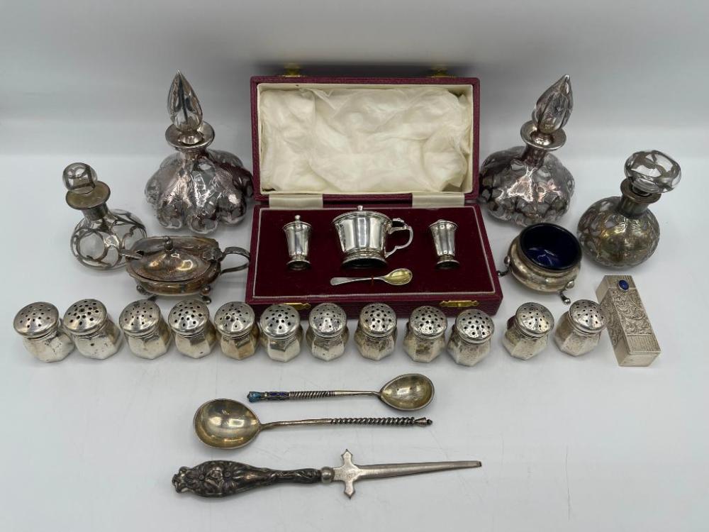 Auction comp thumbnail for Sterling salt and pepper shakers, lipstick holder, silver overlay bottles and more (Schultz Auctioneers, Lot 118)