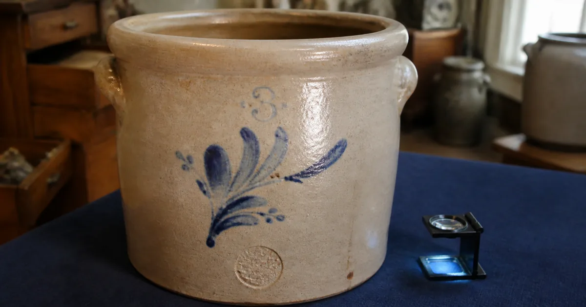 Antique stoneware crocks with cobalt decoration and stamped maker markings