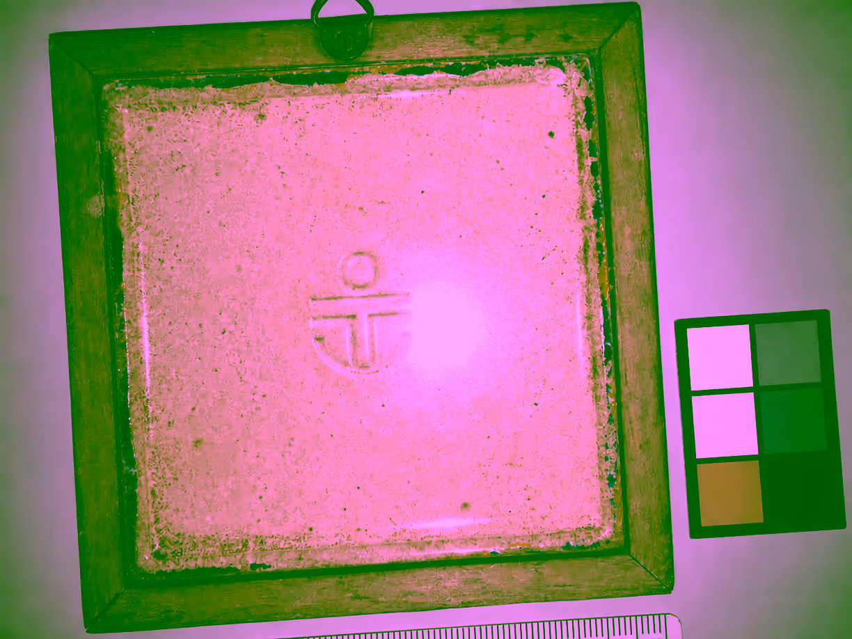 Retake example of the same ceramic tile with harsh flash glare, tilted framing, and the scale cropped at the edge.